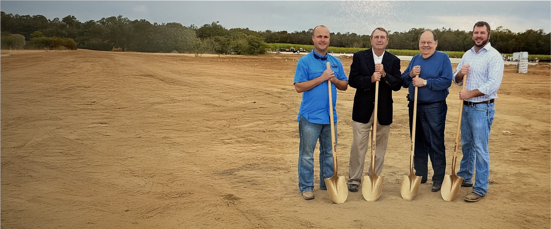Fremin General Contractors team with shovels breaking ground