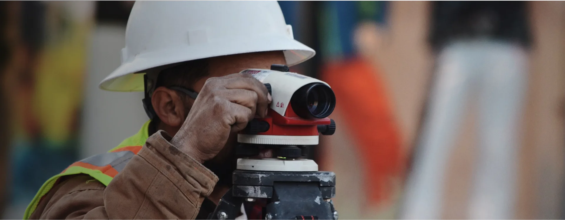 Surveyor leveling ground